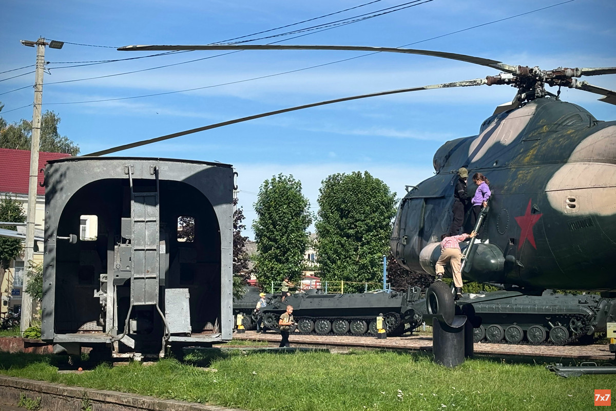 Children play at an open-air military equipment museum in Sovetsk